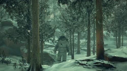 Videohive - Astronaut Exploring Forest in Snow - 33521602 - 33521602