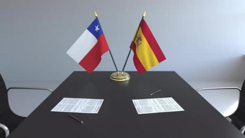 Videohive - Flags of Chile and Spain and Papers on the Table - 33522117 - 33522117