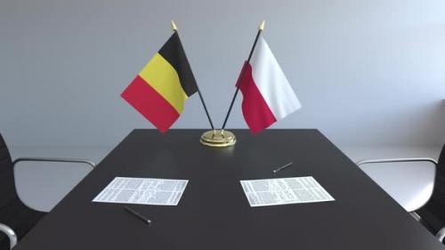 Videohive - Flags of Belgium and Poland and Papers on the Table - 33522122 - 33522122