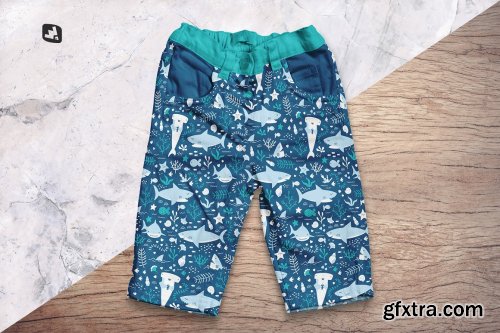 CreativeMarket - Top View Kid’s Jeans Mockup 5060616