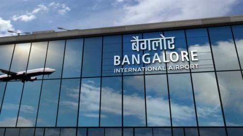 Videohive - Airplane landing at Bangalore India airport mirrored in terminal - 33710401 - 33710401