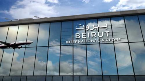 Videohive - Airplane landing at Beirut Lebanon airport mirrored in terminal - 33848126 - 33848126