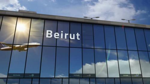 Videohive - Airplane landing at Beirut Lebanon airport mirrored in terminal - 33848128 - 33848128