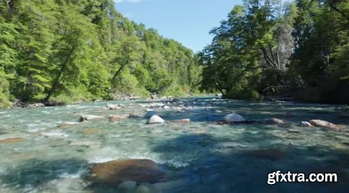 Drone Over Rocky Stream In Countryside 995630