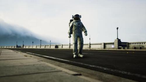 Videohive - Astronaut in Space Suit on the Road Bridge - 34137009 - 34137009