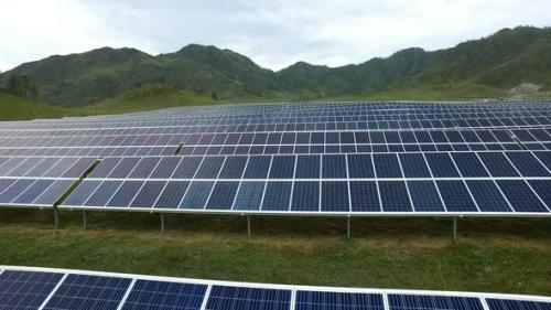 Videohive - Aerial View of Solar Panels Farm in the Mountains - 22981013 - 22981013