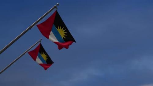 Videohive - Antigua And Barbuda Flags In The Blue Sky - 4K - 34328417 - 34328417