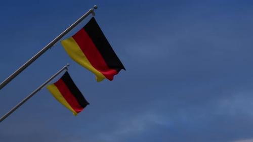 Videohive - Germany Flags In The Blue Sky - 4K - 34446654 - 34446654