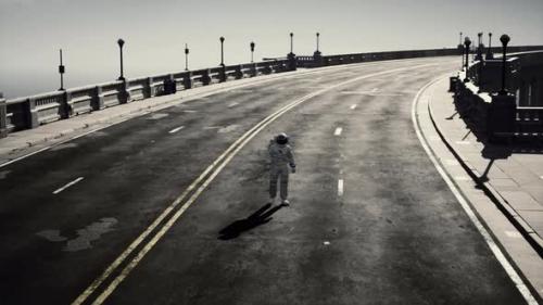 Videohive - Astronaut Walks in the Middle of a Road - 34519700 - 34519700