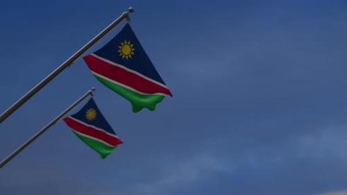 Videohive - Namibia Flags In The Blue Sky - 4K - 34523038 - 34523038