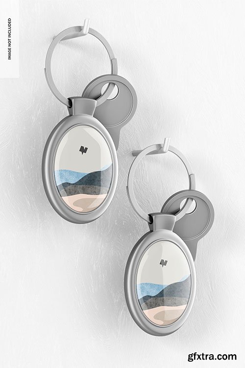 Metallic oval keychain with key mockup