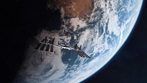 Videohive - International Space Station Entering Earth Atmosphere - 34924493 - 34924493