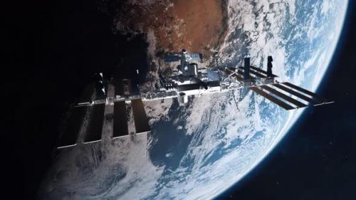 Videohive - International Space Station Medium Establishing Shot with Planet Earth - 34924494 - 34924494