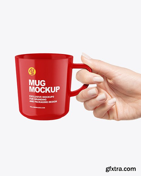 Glossy Mug in a Hand Mockup 89352