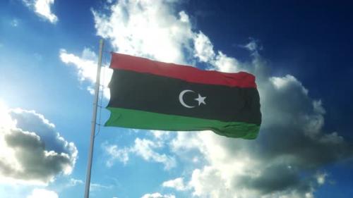 Videohive - Flag of Libya Waving at Wind Against Beautiful Blue Sky - 34943762 - 34943762