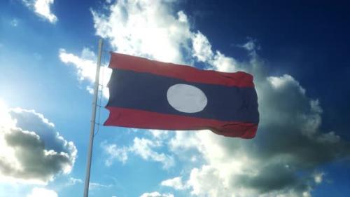 Videohive - Flag of Laos Waving at Wind Against Beautiful Blue Sky - 34943790 - 34943790