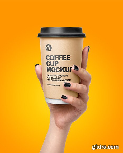 Coffee Cup in a Hand Mockup 56737