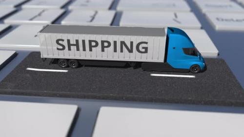 Videohive - SHIPPING Text on the Truck Driving on the Keyboard Key - 35082580 - 35082580