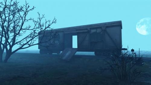 Videohive - An old, abandoned and broken carriage stands in a terrible fog on the railway. - 35101763 - 35101763