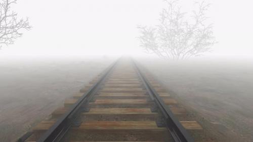 Videohive - Travel by train on the railroad in the fog. - 35101764 - 35101764