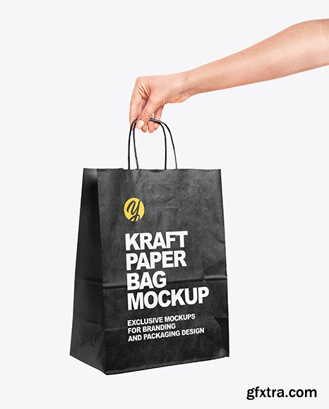 Hand Holding a Paper Bag Mockup 55315