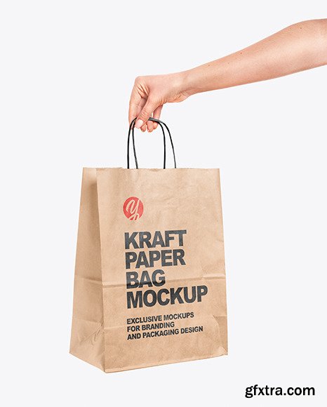 Hand Holding a Paper Bag Mockup 55315