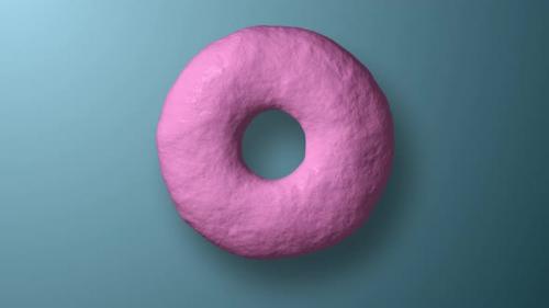 Videohive - Pink Donut Moves and Rotates on a Blue Background - 35345589 - 35345589