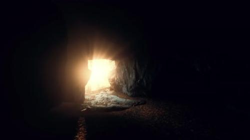 Videohive - Breathtaking Scenery of Bright Sun Rays Falling Inside a Cave Illuminating - 35366946 - 35366946