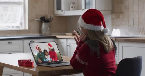 Videohive - Caucasian woman spending time at home wearing santa hat - 35352929 - 35352929