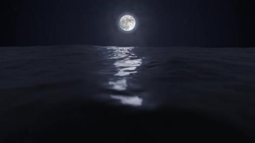 Videohive - Beautiful Clear Moon Reflecting In The Ocean Or Sea Night Sky With Stars Loop 4k - 30368342 - 30368342