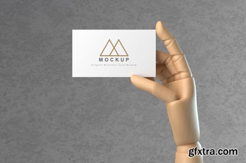 Business Card in Wooden Hand Mockups