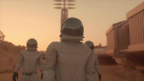 Videohive - Three Astronauts in Spacesuits Explore the Planet Mars - 35368531 - 35368531