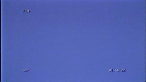 Videohive - VCR Flash Forward symbol on blue screen. - 35371491 - 35371491