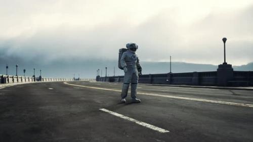 Videohive - Astronaut in Space Suit on the Road Bridge - 35496141 - 35496141