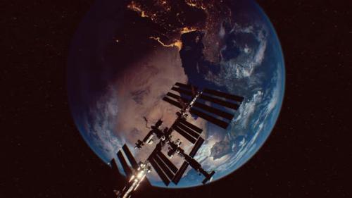 Videohive - International Space Station in Outer Space Over the Planet Earth Orbit - 35536167 - 35536167