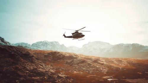 Videohive - Slow Motion Vietnam War Era Helicopter in Mountains - 35536527 - 35536527