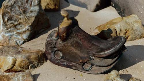 Videohive - Very Old Horse Saddle on Sand Beach - 35763060 - 35763060