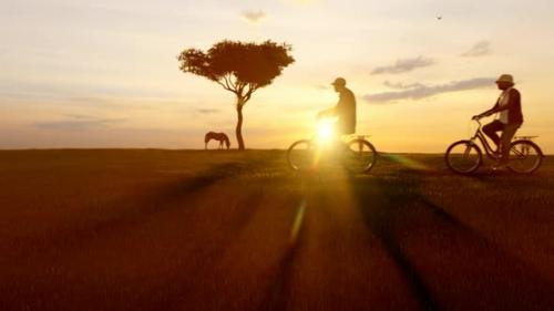 Videohive - Elderly couple cycling in the Sunset Landscape - 35804224 - 35804224