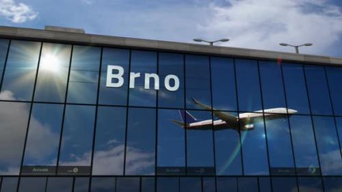 Videohive - Airplane landing at Brno Czech airport mirrored in terminal - 35785187 - 35785187