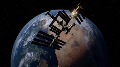 Videohive - International Space Station in Outer Space Over the Planet Earth Orbit - 36343268 - 36343268