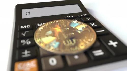 Videohive - Bitcoin Currency Symbol on the Keys and MINING Text on Calculator - 36407152 - 36407152