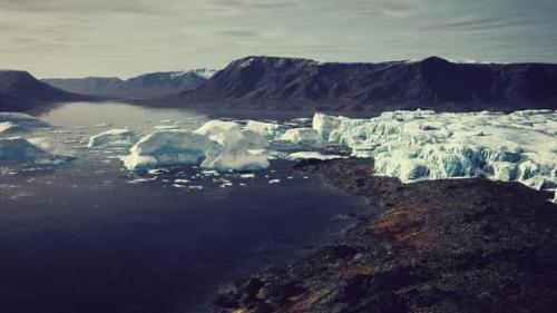 Videohive - Glacier Flow Through the Mountains in Iceland - 36456759 - 36456759