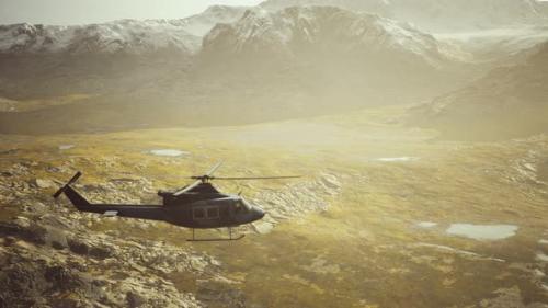 Videohive - Slow Motion Vietnam War Era Helicopter in Mountains - 36679792 - 36679792