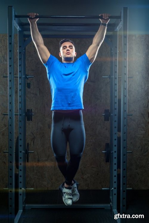 Athlete in training in the gym with a barbell