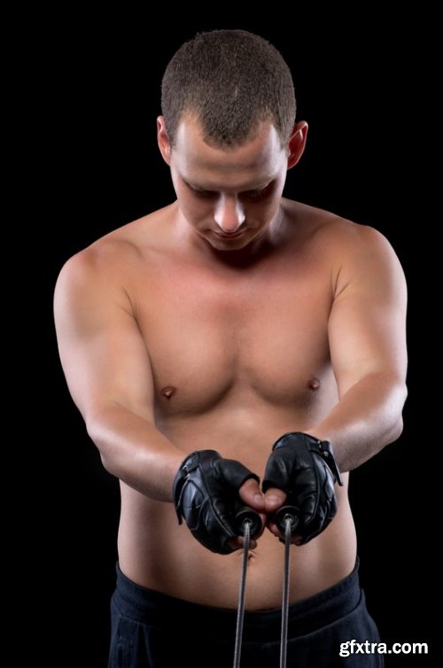 Vertical portrait of an athlete on dark background