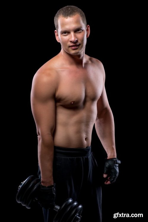 Vertical portrait of an athlete on dark background