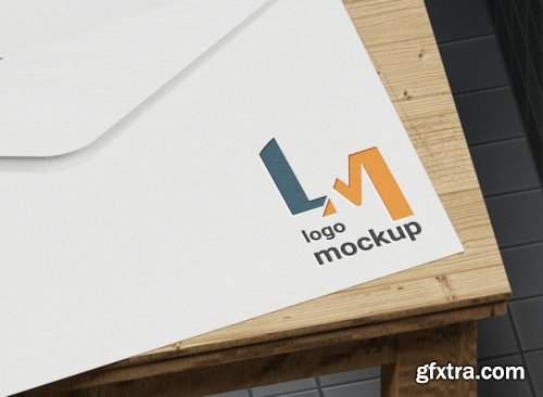 Logo mockup on paper letter on table