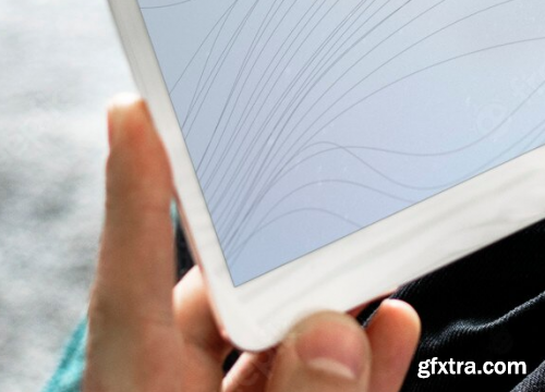 Man using a tablet with a screen mockup 