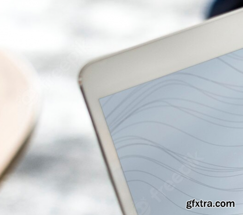 Man using a tablet with a screen mockup 