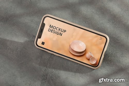 Phone on concrete wall Mockup